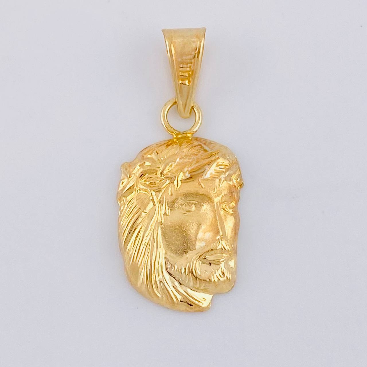 Dije Rostro Cristo 0.75 g / 1 in Oro Amarillo 18K