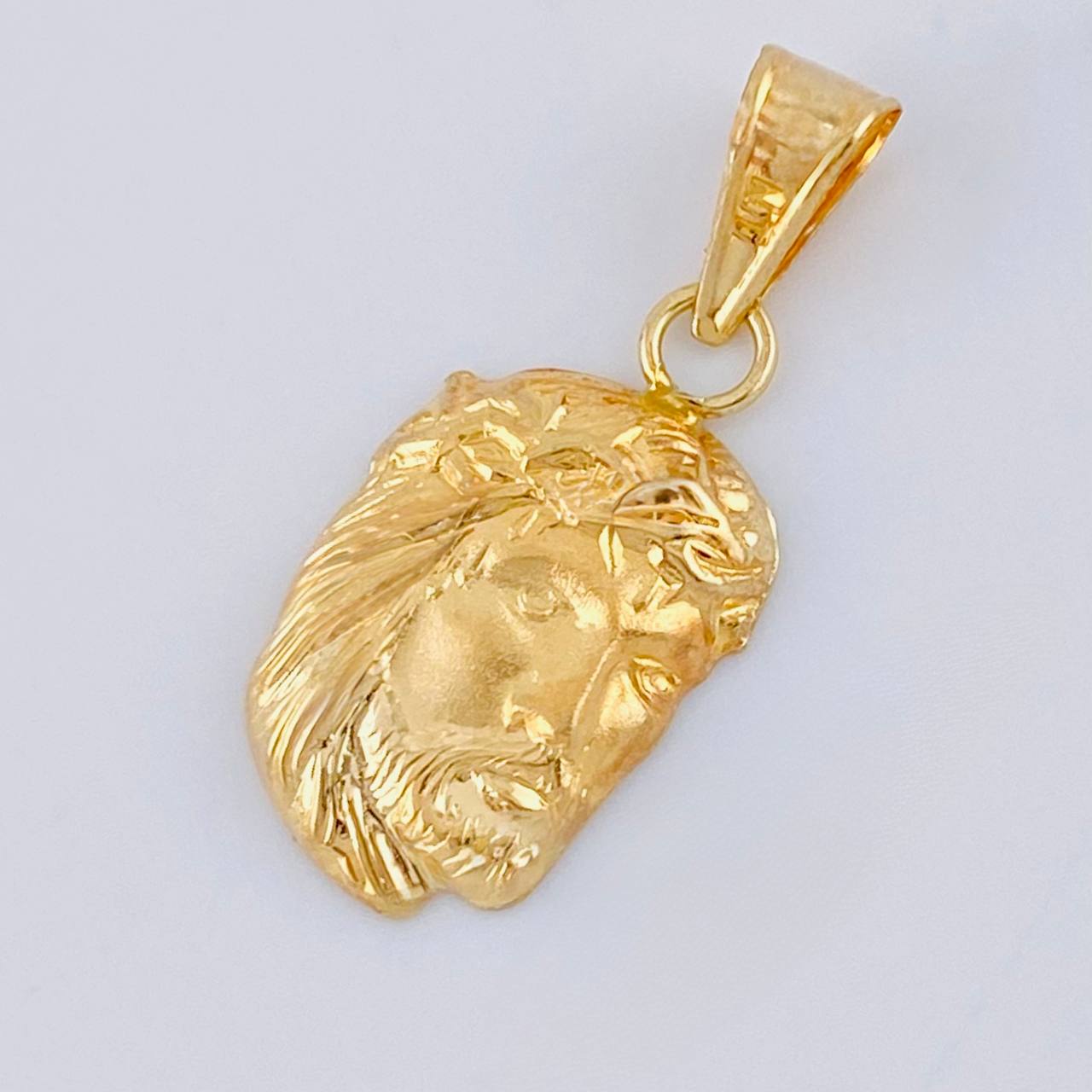 Dije Rostro Cristo 0.75 g / 1 in Oro Amarillo 18K