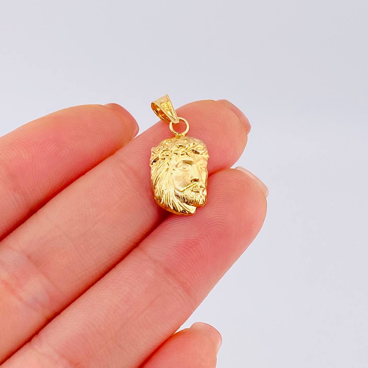 Dije Rostro Cristo 0.75 g / 1 in Oro Amarillo 18K