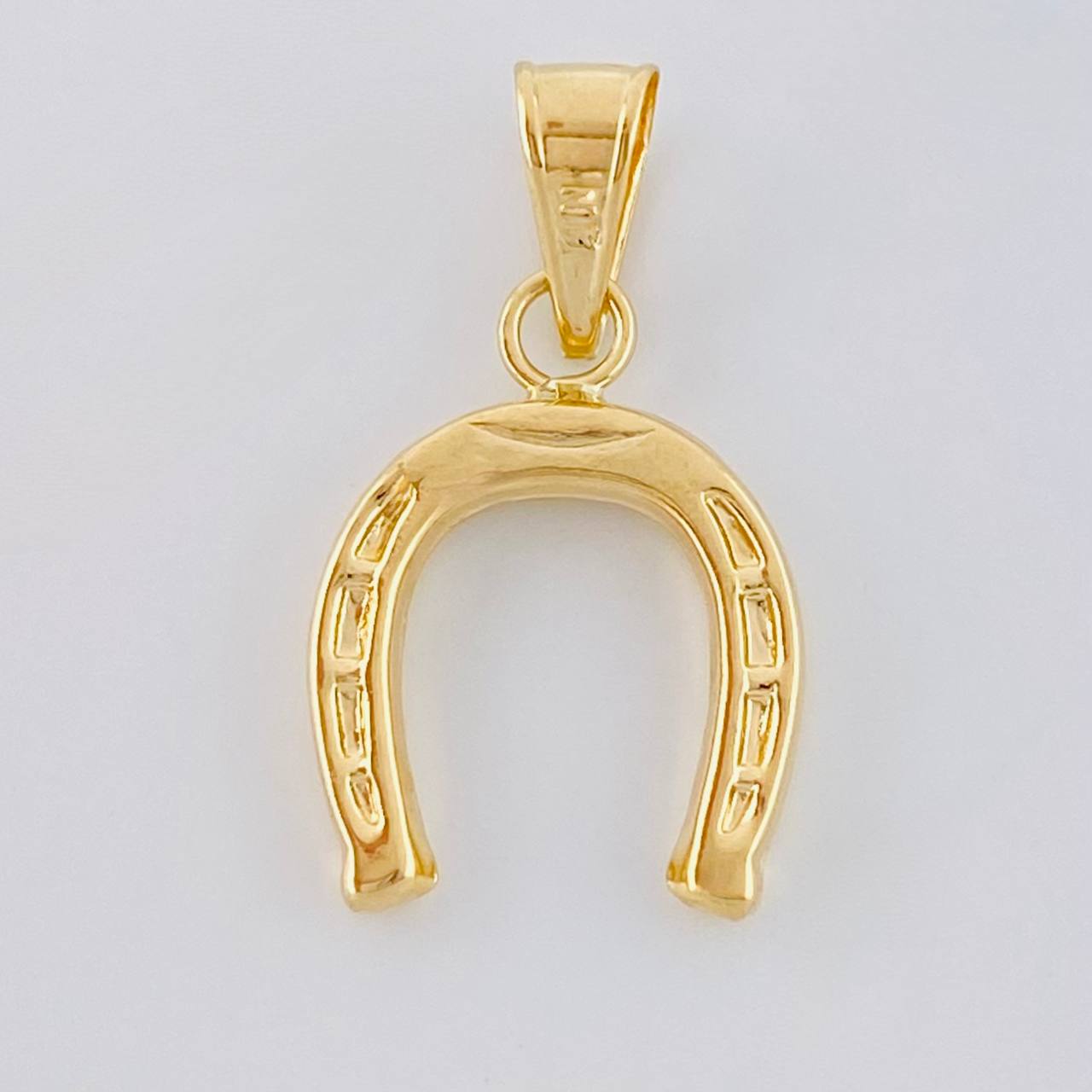 Dije Herradura 0.7 g / 3/4 in Oro Amarillo 18K