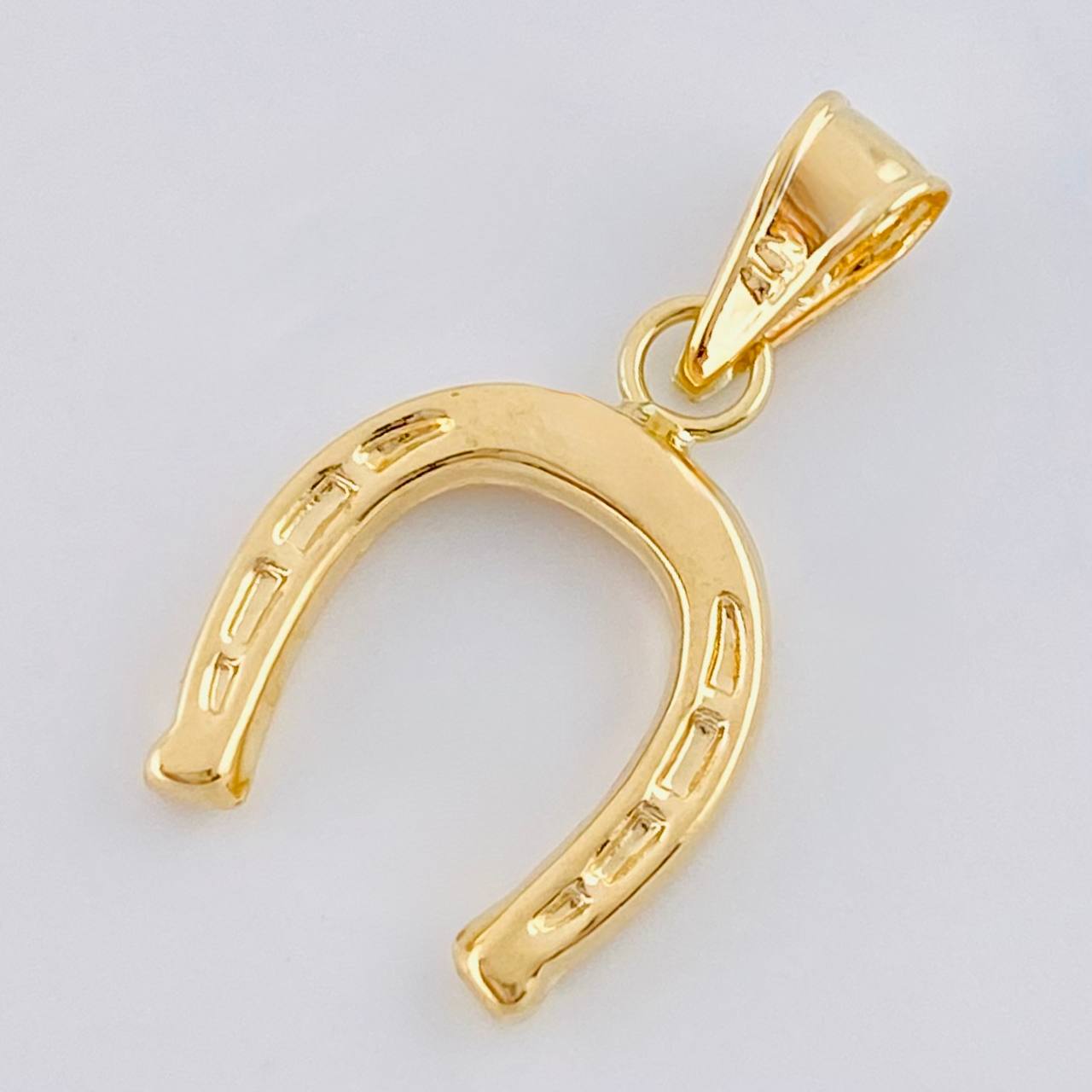 Dije Herradura 0.7 g / 3/4 in Oro Amarillo 18K