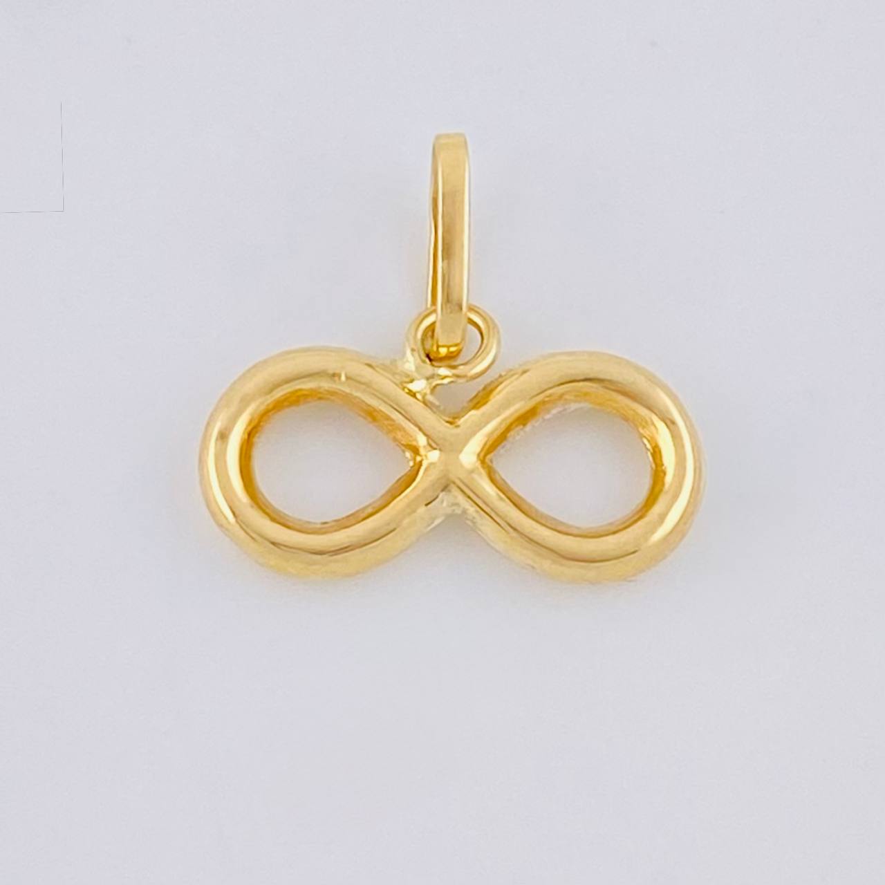 Dije Infinito 0.45 g / 1/2 in Oro Amarillo 18K
