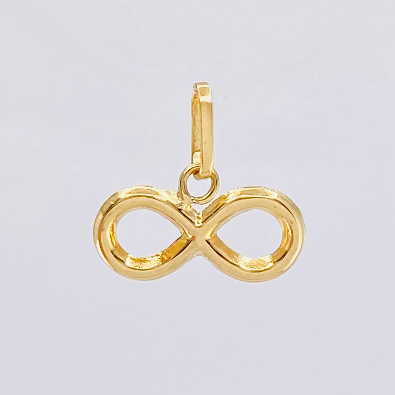 Dije Infinito 0.45 g / 1/2 in Oro Amarillo 18K