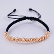 Pulsera Tejida Negra Bolas Lisas 10 Und- 4Mm / Diamantada 9 Und- 3Mm Oro Rosa 18K (A.C)