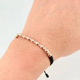 Pulsera Tejida Negra Bolas Lisas 10 Und- 4Mm / Diamantada 9 Und- 3Mm Oro Rosa 18K (A.C)