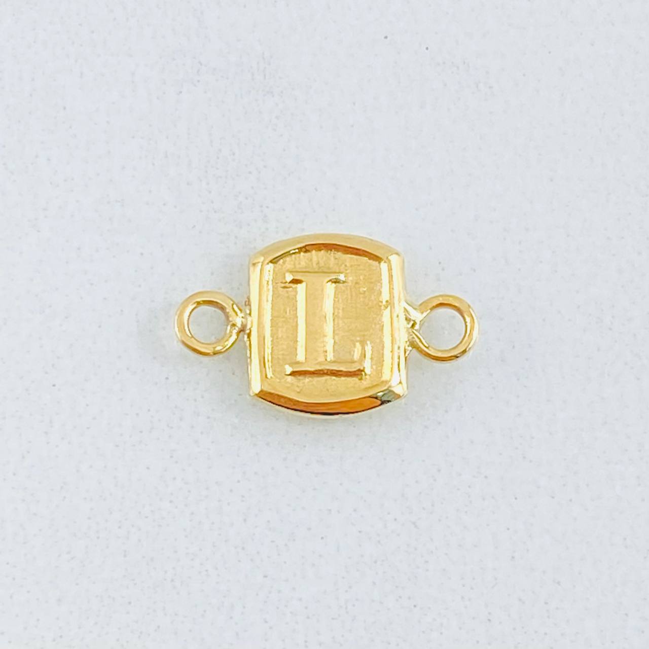 Herraje Letra L 0.3gr / 1/2 in / Oro Amarillo 18K