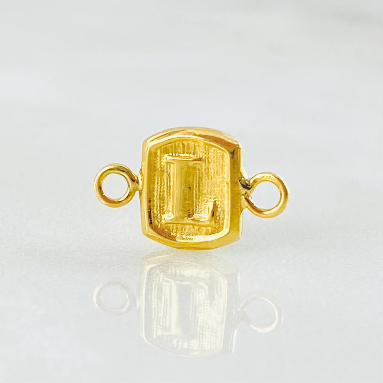 Herraje Letra L 0.3gr / 1/2 in / Oro Amarillo 18K