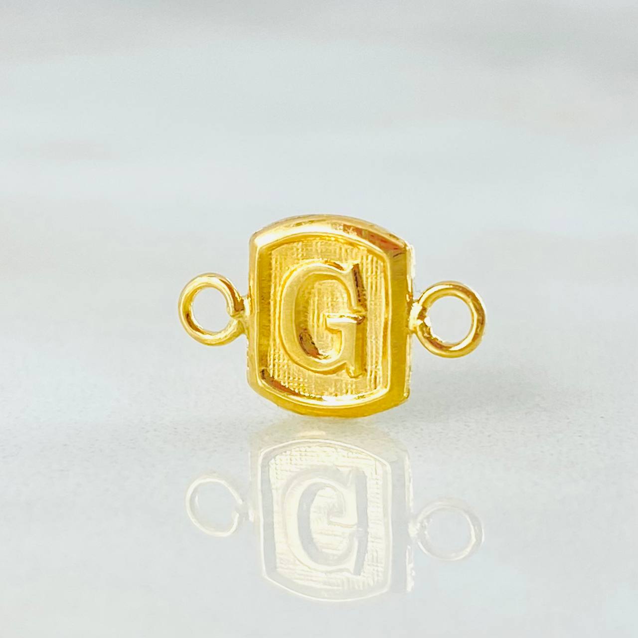Herraje Letra G 0.35gr / 1/2 in / Oro Amarillo 18K