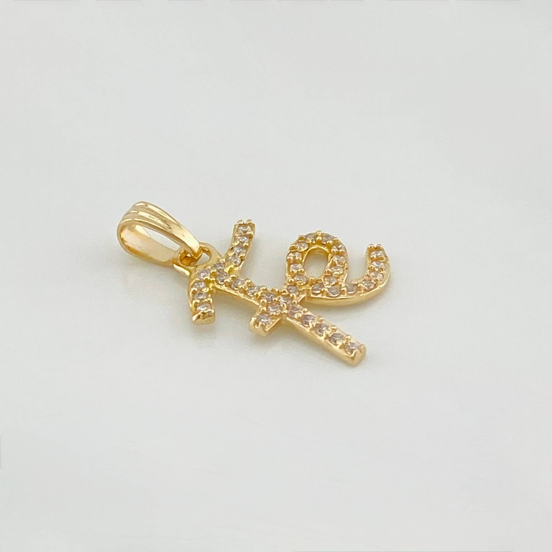 Dije Fe 1.1g / 3/4 in Oro Amarillo 18K