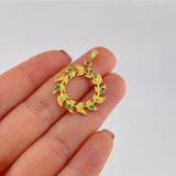Dije Hojas en Espiral 2.9gr / 3cm / Esmeraldas 18pts Oro Amarillo 18K (Joya) ©