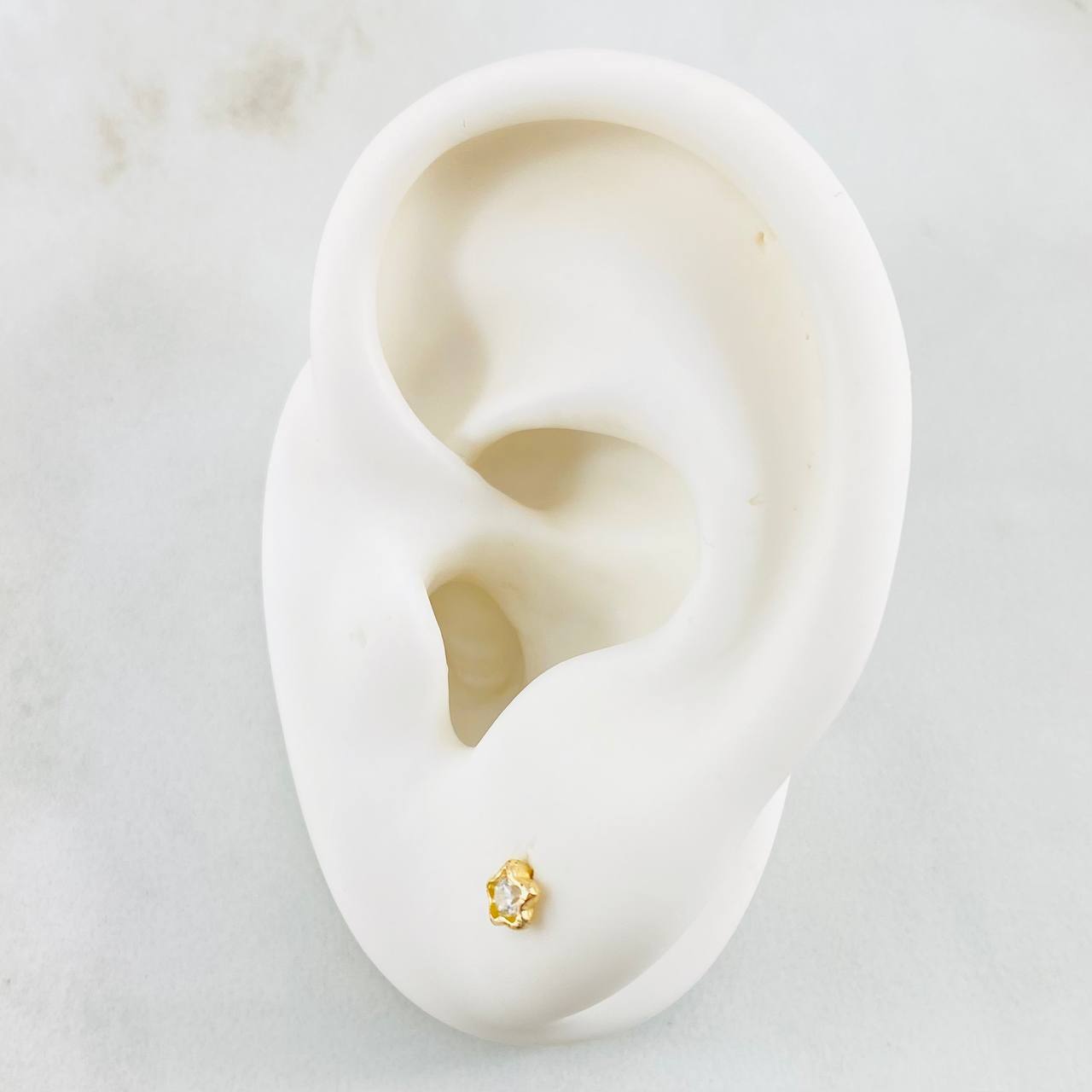 Topos Estrella 0.65gr / 4mm Oro Amarillo 18K *