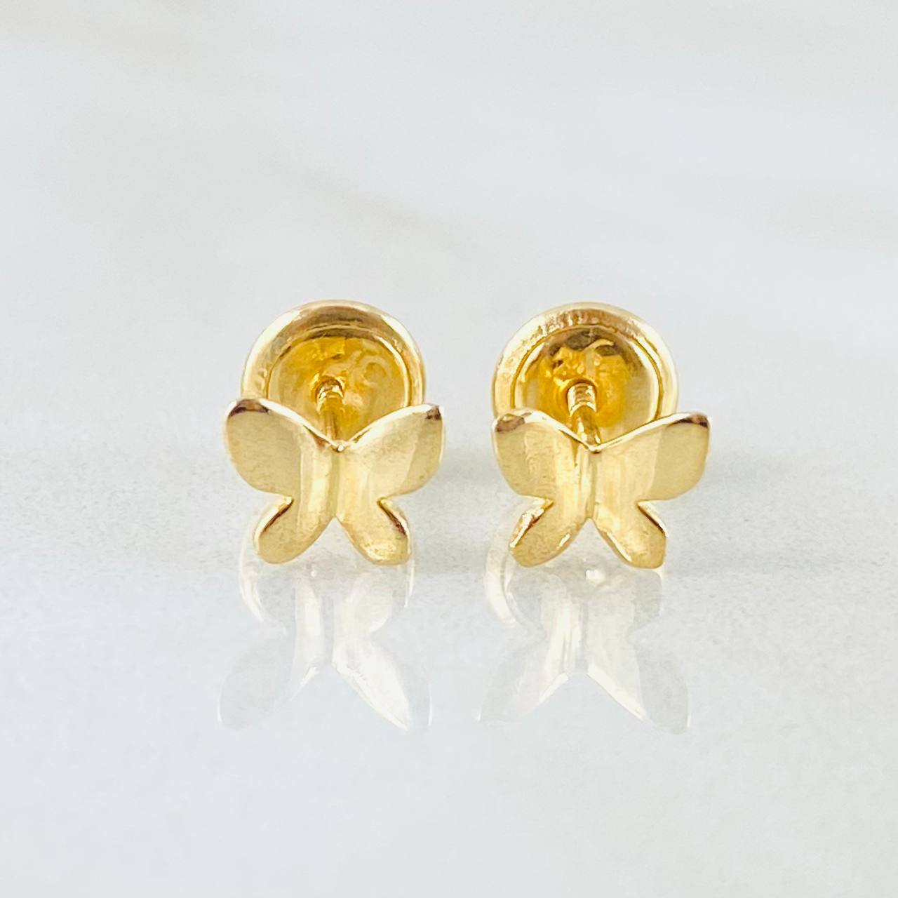 Topos Mariposa 0.7gr / Oro Amarillo 18K ©