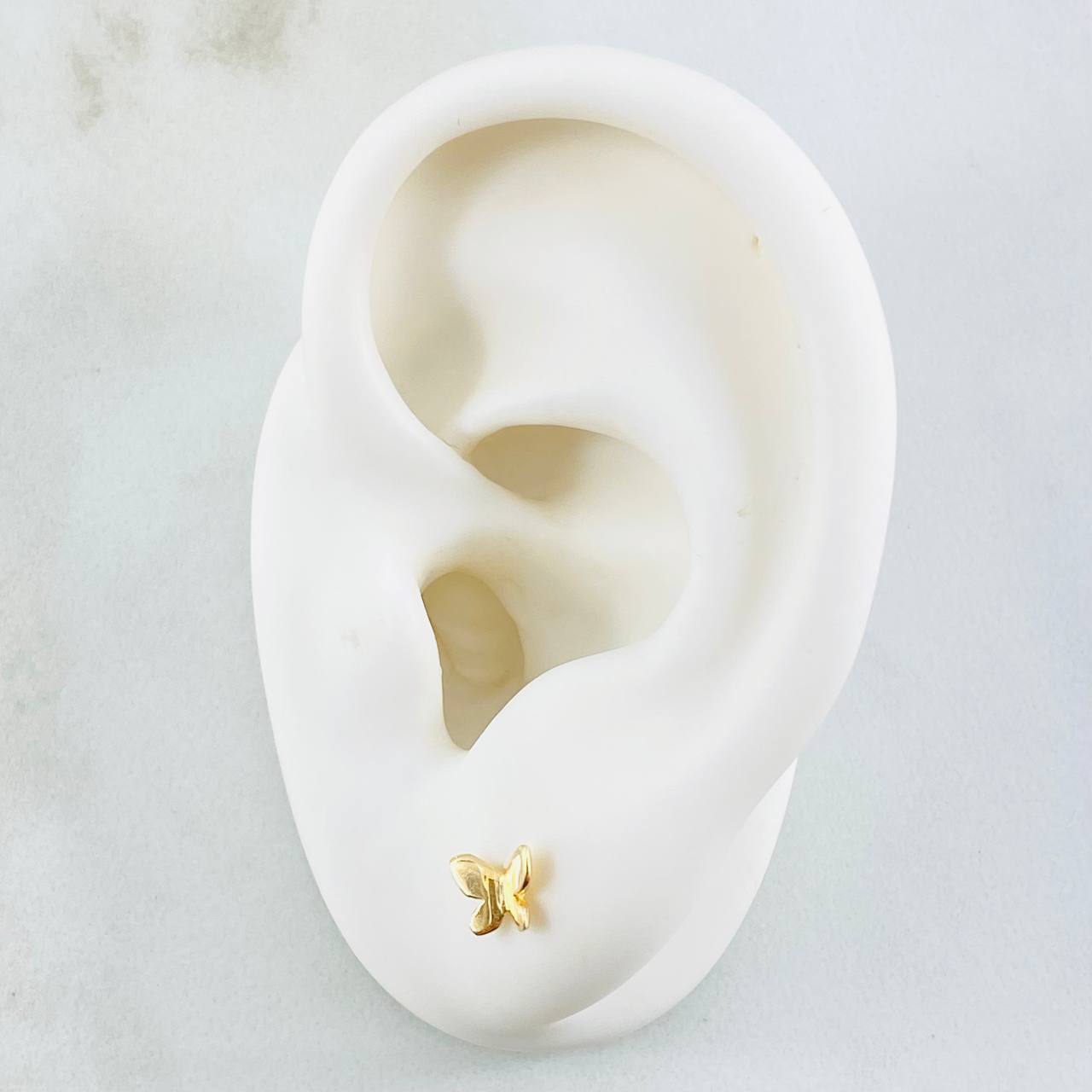 Topos Mariposa 0.7gr / Oro Amarillo 18K ©