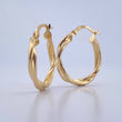 Candongas Tere 1.95gr / 2.5cm / Entorchada Oro Amarillo 18K &
