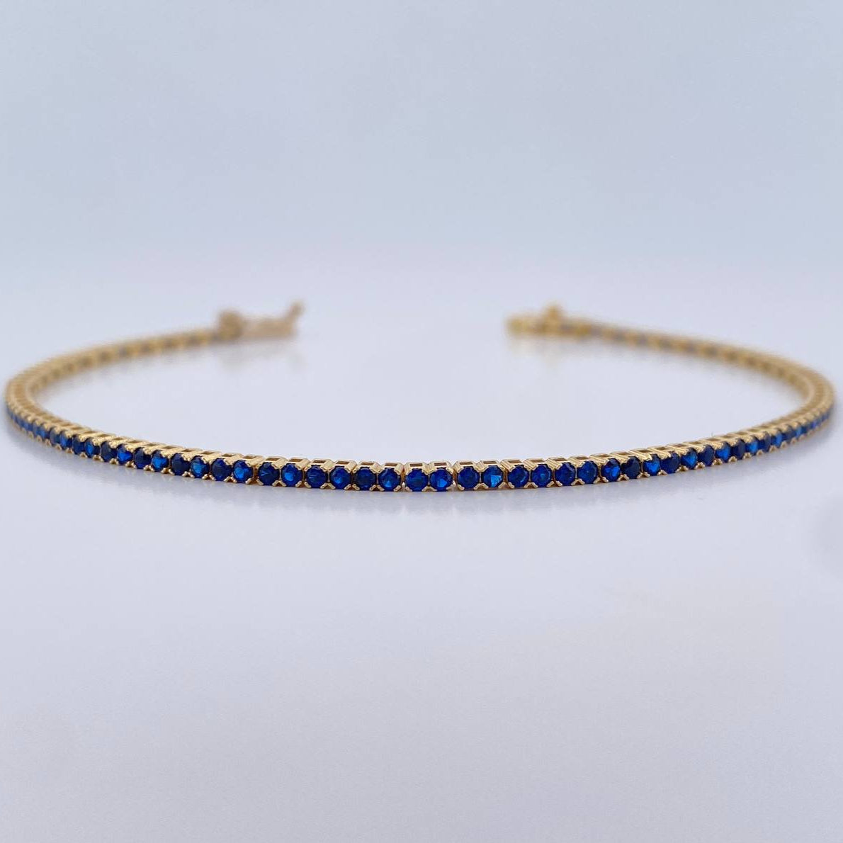 Bracelet Tennis 3.3gr / 16.8cm / 1.45mm Blue Zircons 18K Yellow Gold &