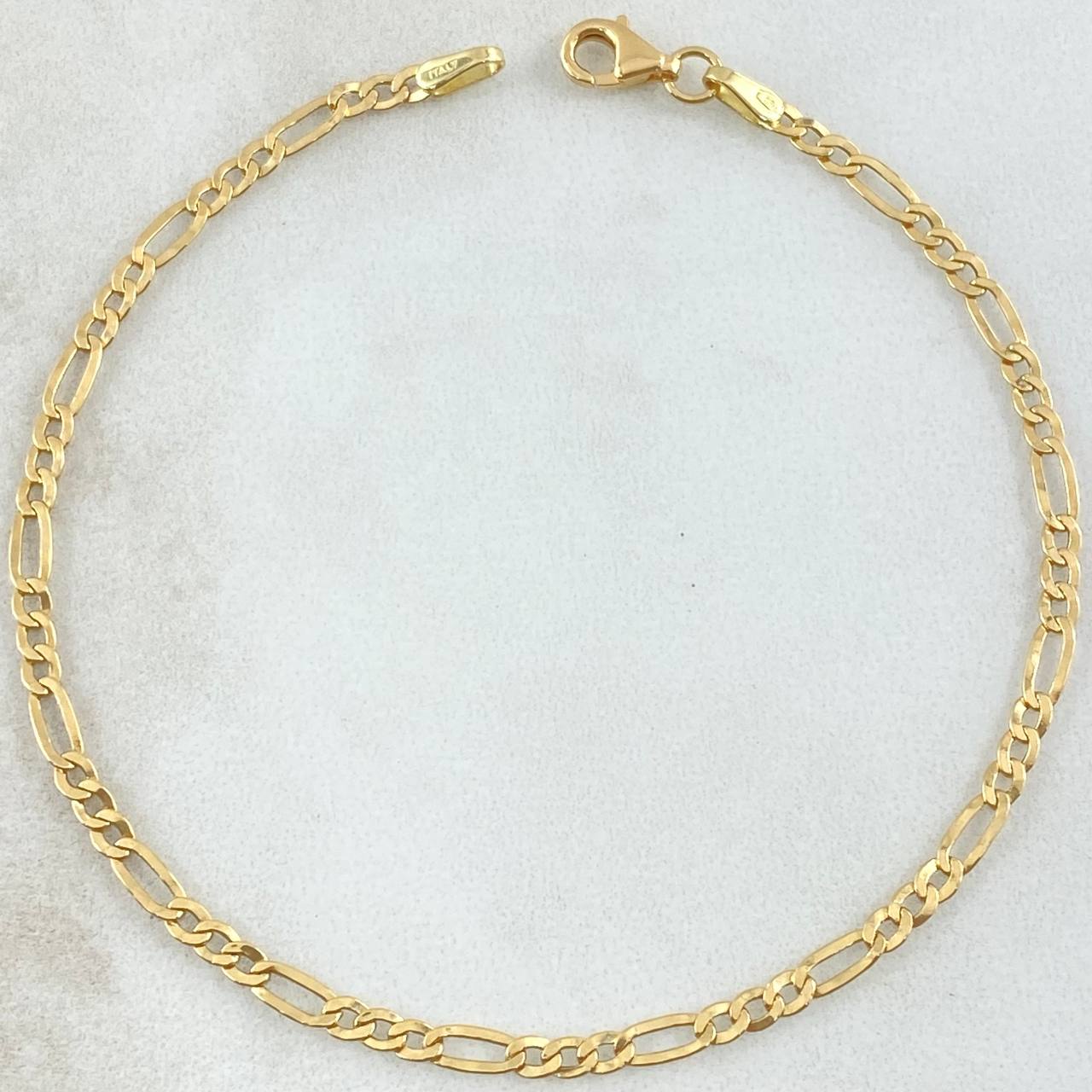 Figaro Bracelet 1.4gr / 7.7in / +1 18K Gold ©
