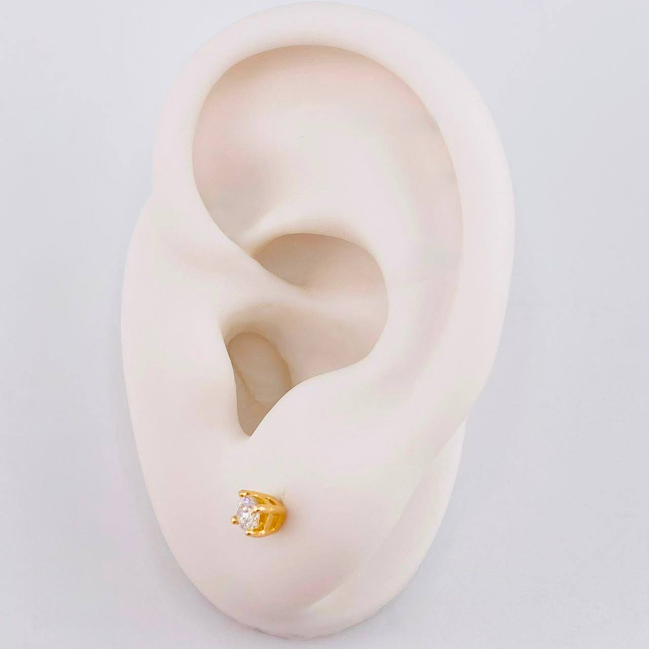 Topos Cuatro Garras Diamantes 25pts 1.15g / in / 3.4mm Oro Amarillo 18K