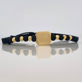 Pulsera Tejida Negra Placa Cuadrada Bolas Diamantadas Oro Amarillo 18K