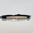Pulsera Tejida Negra Tennis Oro Amarillo 18K