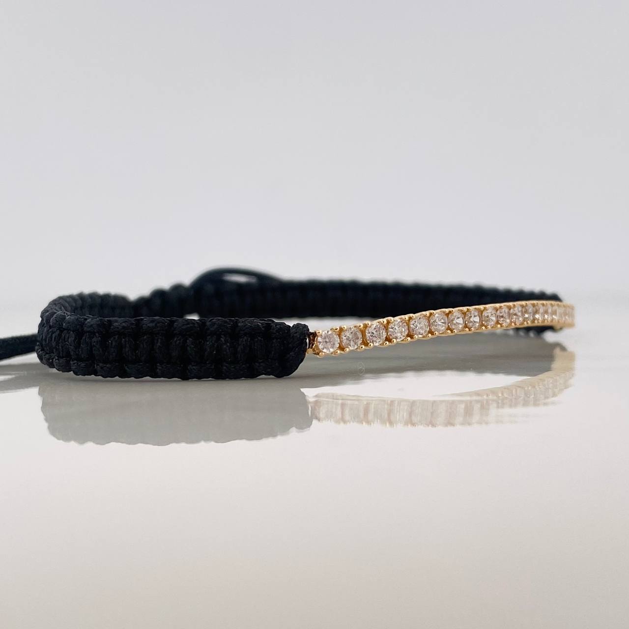 Pulsera Tejida Negra Tennis Oro Amarillo 18K