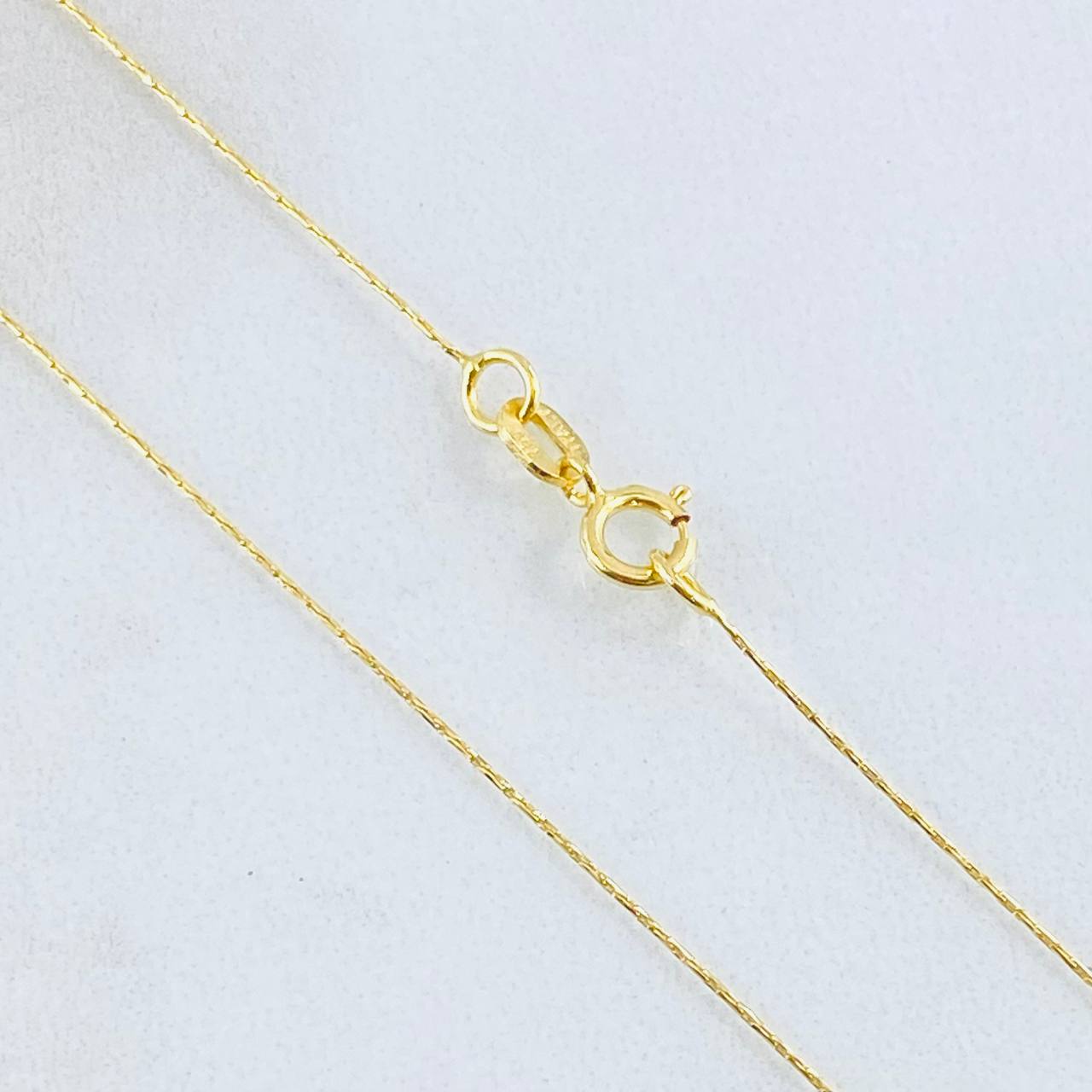 Set Cadena y Dije Aguja Trenzada + Piedra 1.25gr / 17 3/4 in / Oro Amarillo 18K