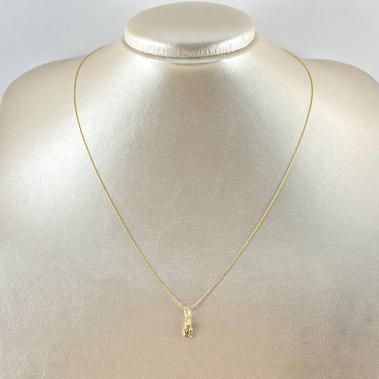 Set Cadena y Dije Aguja Trenzada + Angel 1.15gr / 17 3/4 in / Oro Amarillo 18K