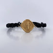 Pulsera Negra Herraje San Benito 2.25gr / Troquelada Oro Amarillo 18K &