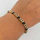 Pulsera Negra Herrajes Lunas 6.7gr / Neoprenos Oro Amarillo 18K &