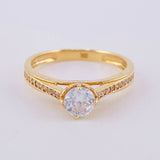 Solitaire Ring with Heart Bridges 2.6 g / T7 Yellow Gold 18K