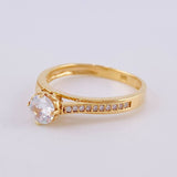 Solitaire Ring with Heart Bridges 2.6 g / T7 Yellow Gold 18K