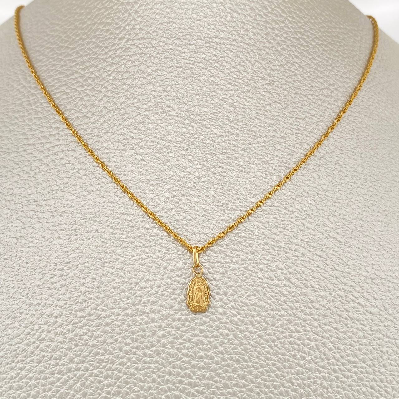 Set Cadena y Dije Lazo + Virgen Guadalupe 1.35gr / 19 3/4 in / Oro Amarillo 18K $