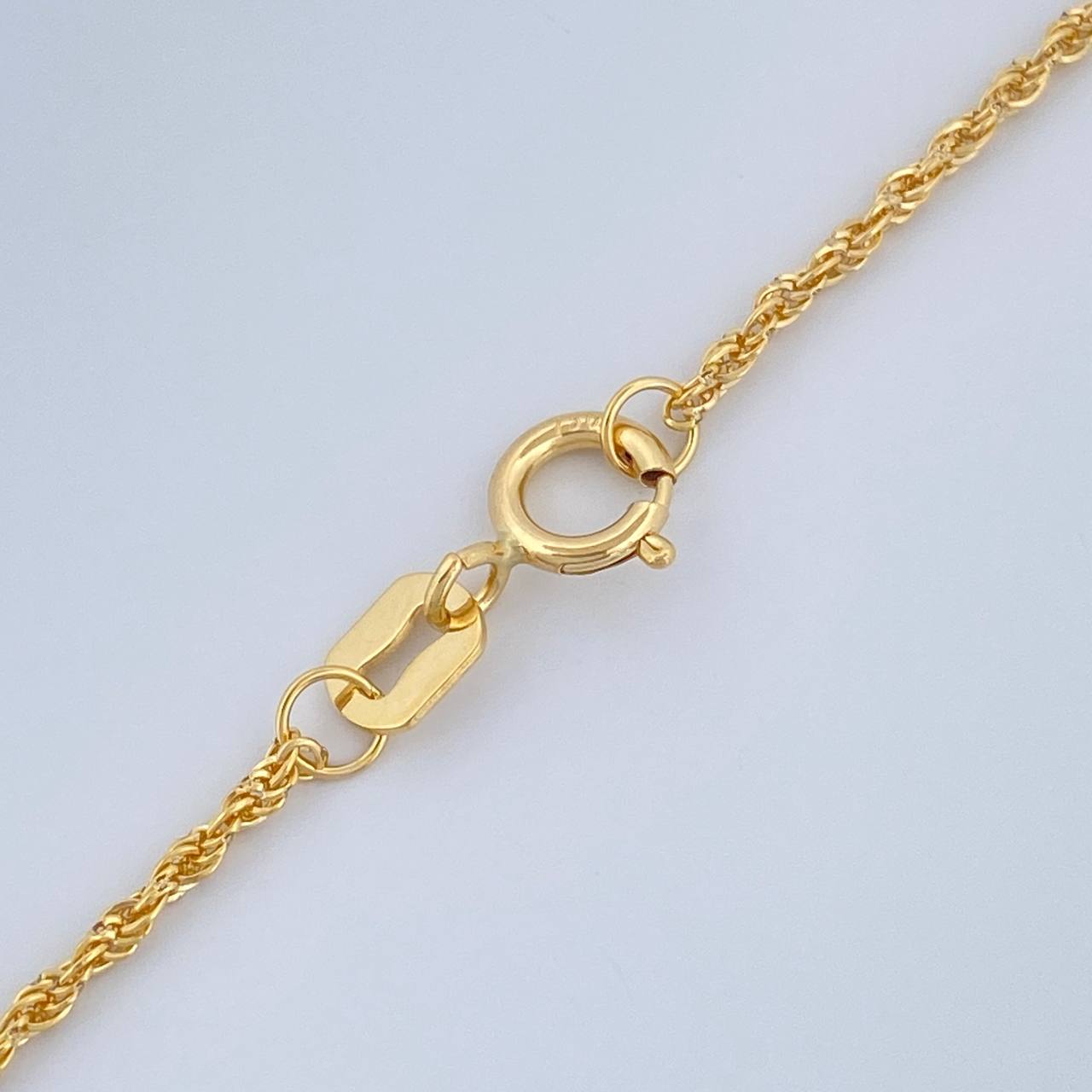 Set Cadena y Dije Lazo + Cruz Anj 1.35gr / 19 3/4 in / Oro Amarillo 18K $