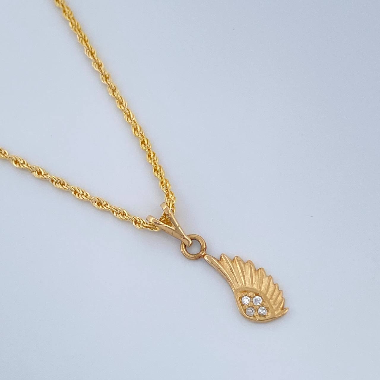 Set Cadena y Dije Lazo + Ala 1.35gr / 15 3/4 in / Oro Amarillo 18K $