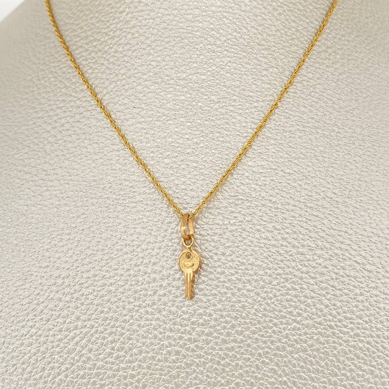 Set Cadena y Dije Lazo + Llave 1.4gr / 15 1/2 in / Oro Amarillo 18K $