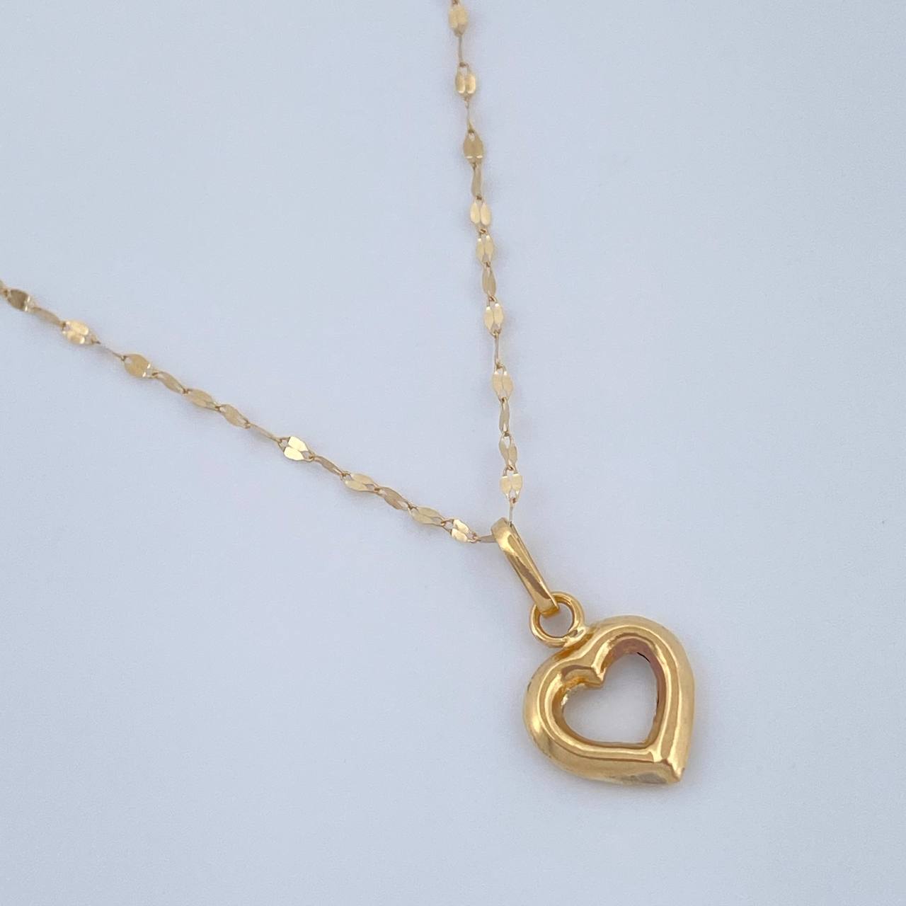 Set Cadena y Dije Flor Espejo + Silueta Corazon 0.75gr / 17 3/4 in / Oro Amarillo 18K $