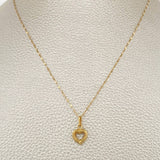 Set Cadena y Dije Flor Espejo + Silueta Corazon 0.75gr / 17 3/4 in / Oro Amarillo 18K $