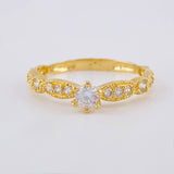 Double Bow Solitaire Ring 2 g / T7 18K Yellow Gold