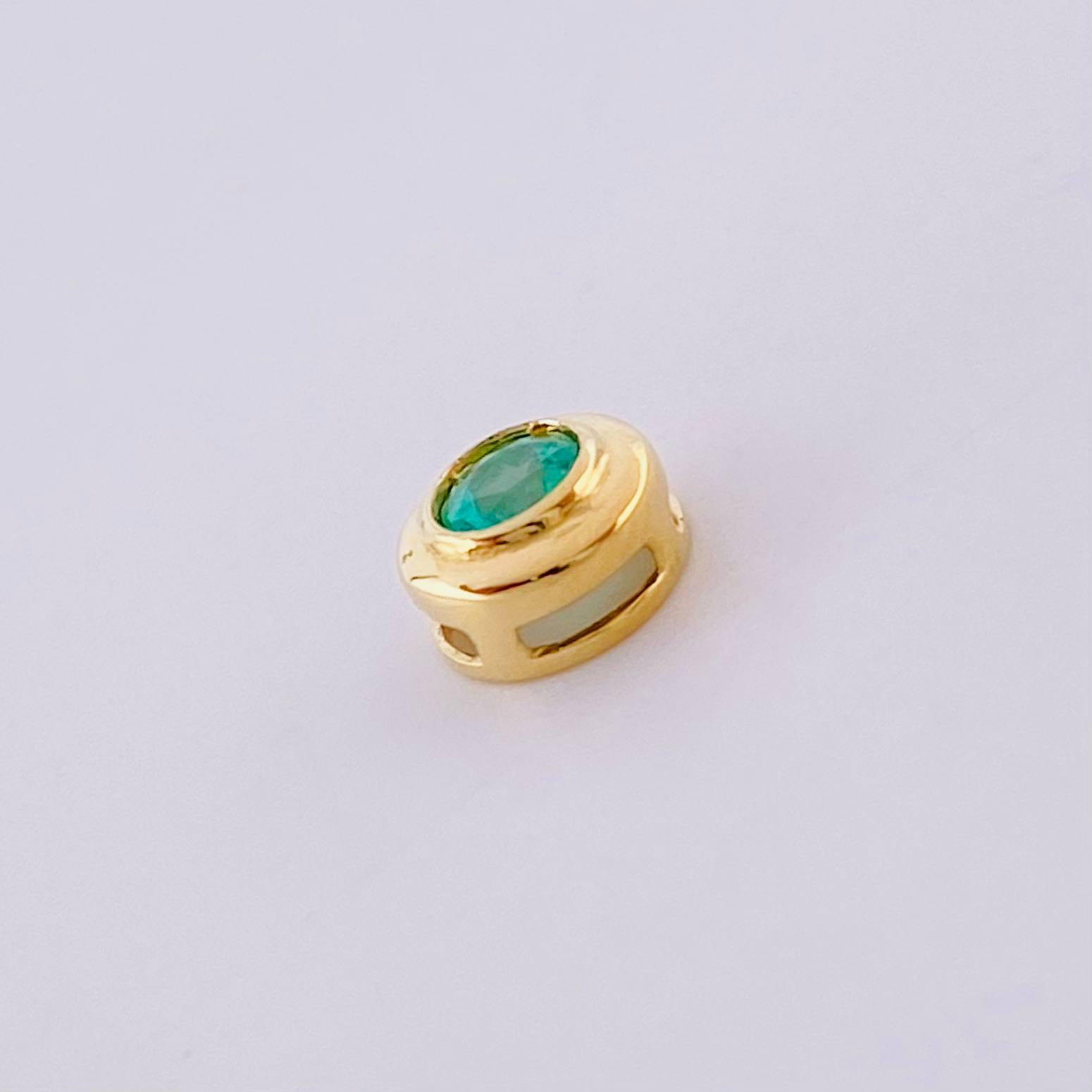 Dije Ojo Esmeralda 14pts 0.55g / 1/4 in Oro Amarillo 18K