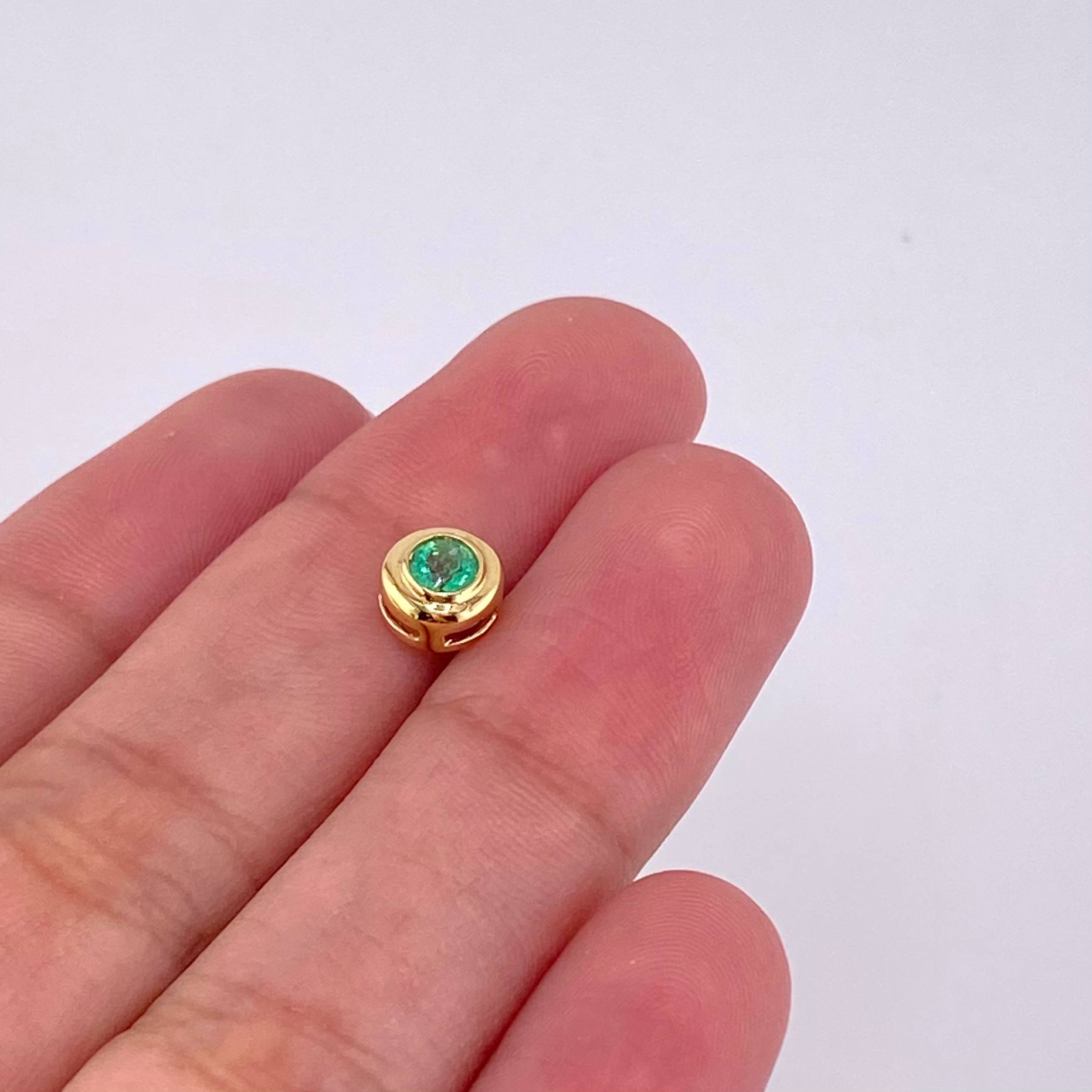Dije Ojo Esmeralda 14pts 0.55g / 1/4 in Oro Amarillo 18K