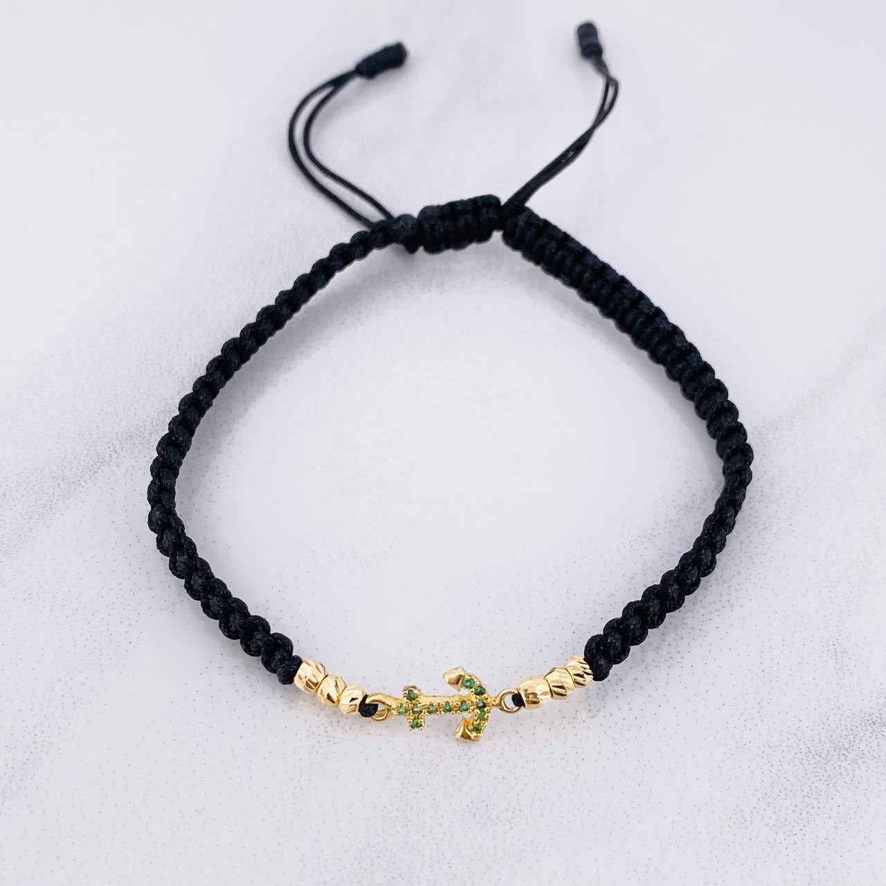 Pulsera Tejida Negra Ancla Bolas Diamantadas Oro Amarillo 18K