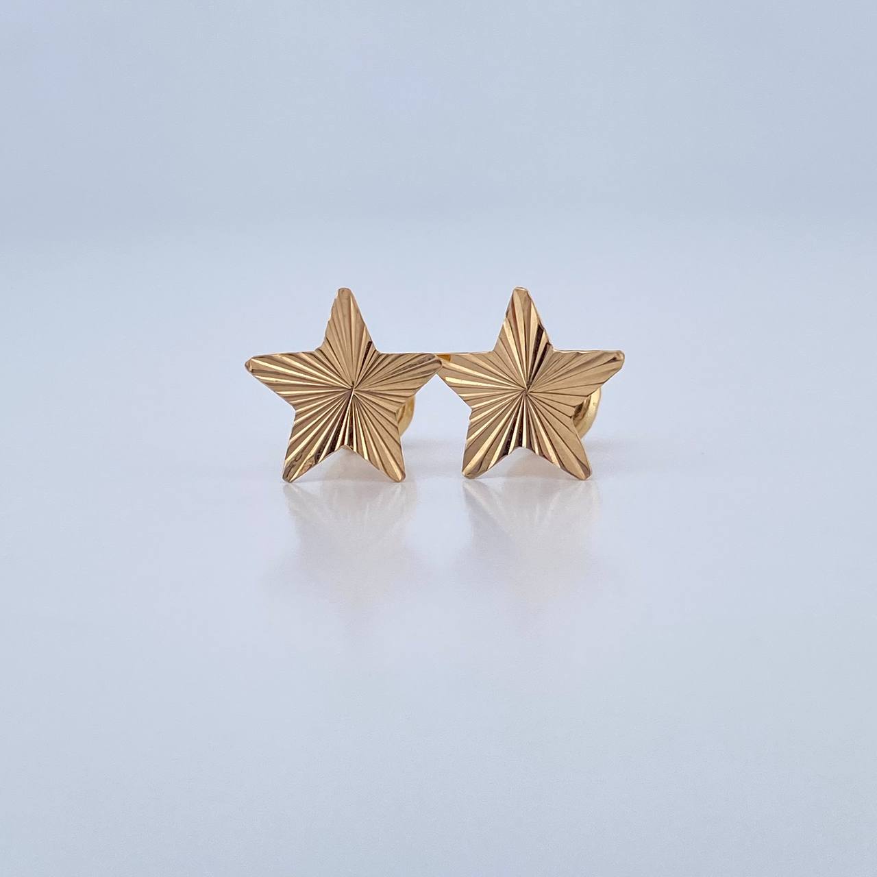 Topos Estrella 0.7gr / Oro 18K &