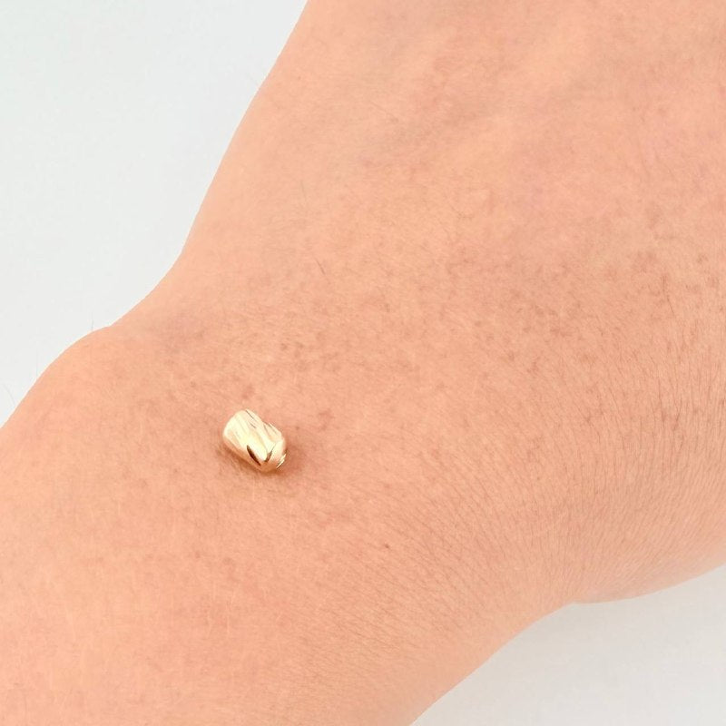 Herraje Cilindro Diamantado 0.15g / 1/4 in Oro Amarillo 18K