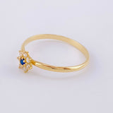 Anillo Solitario Flor 7 Petalos 1.45g / T7 1/2 Oro Amarillo 18K