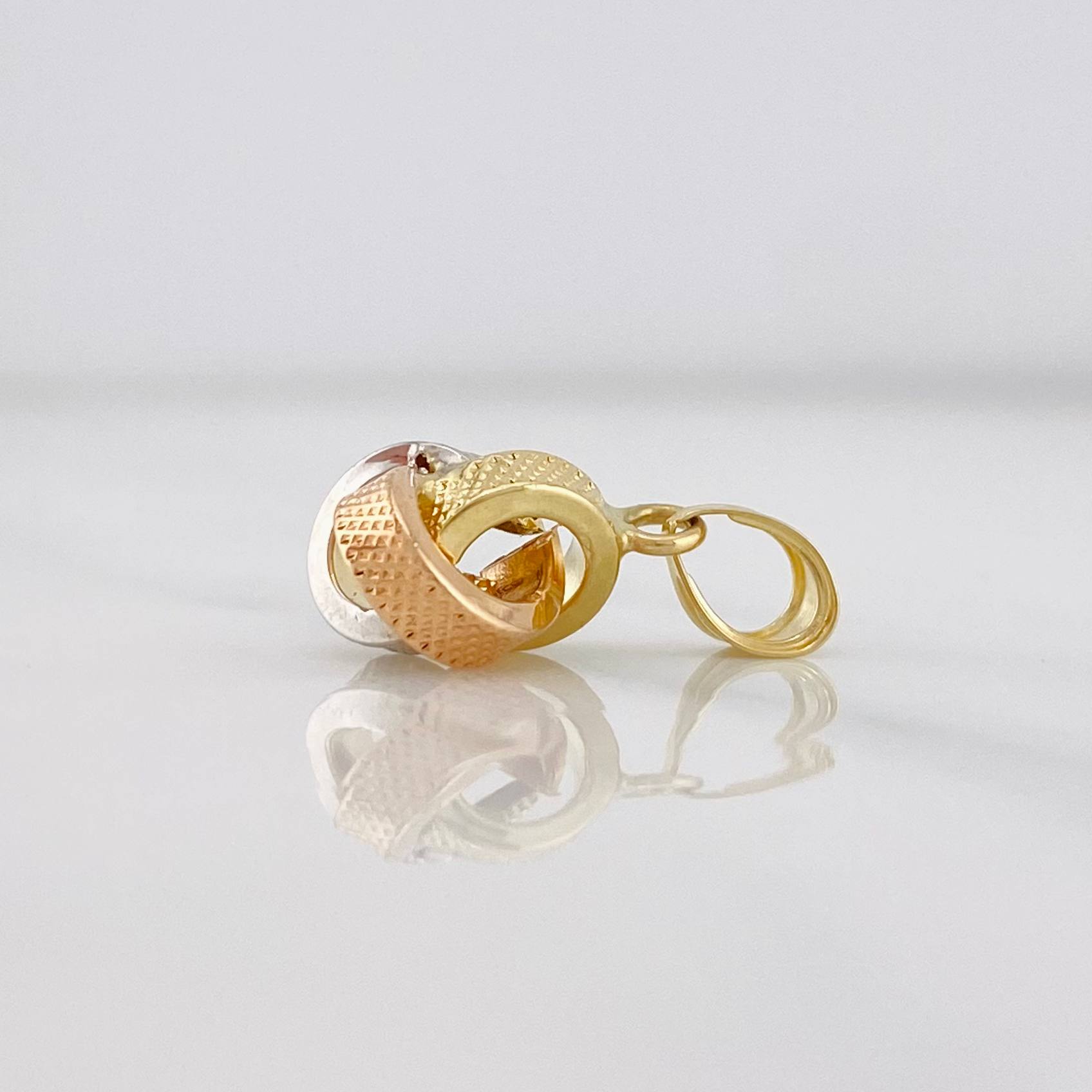 Pendant Knot 0.55g / 1/2 in Three Golds 18K