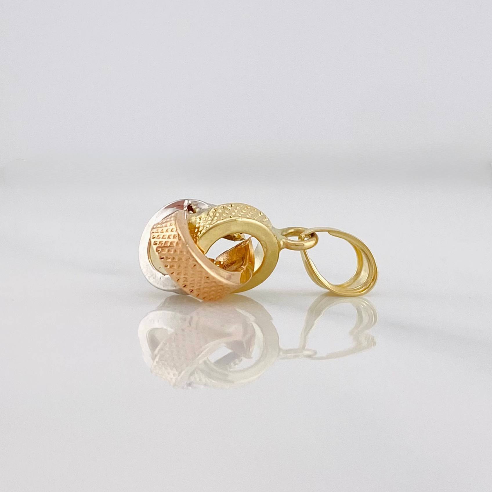 Pendant Knot 0.55g / 1/2 in Three Golds 18K