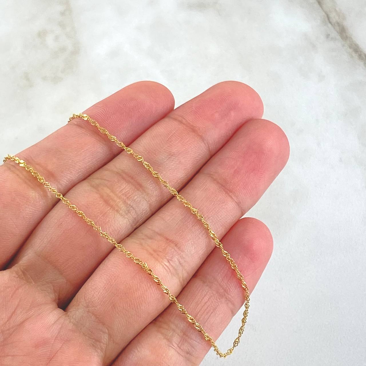 Cadena Singapur 3.1gr / 23 1/2 in / Oro Amarillo +3 18K