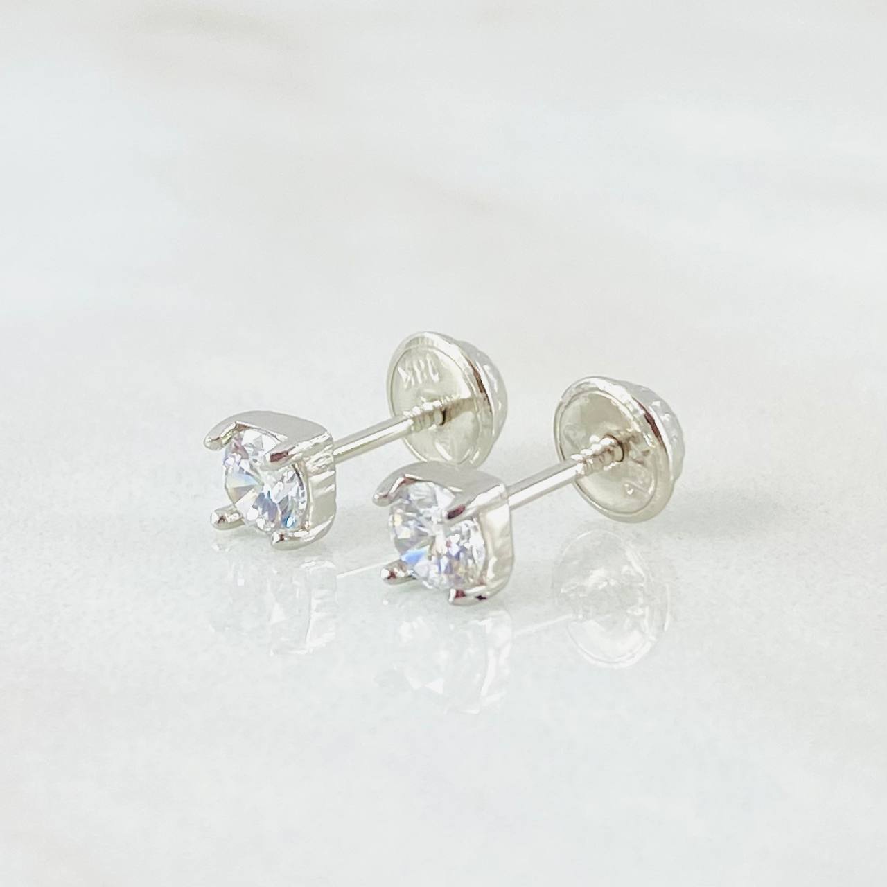 Topos Bisel 0.85gr / Oro Blanco 18K *