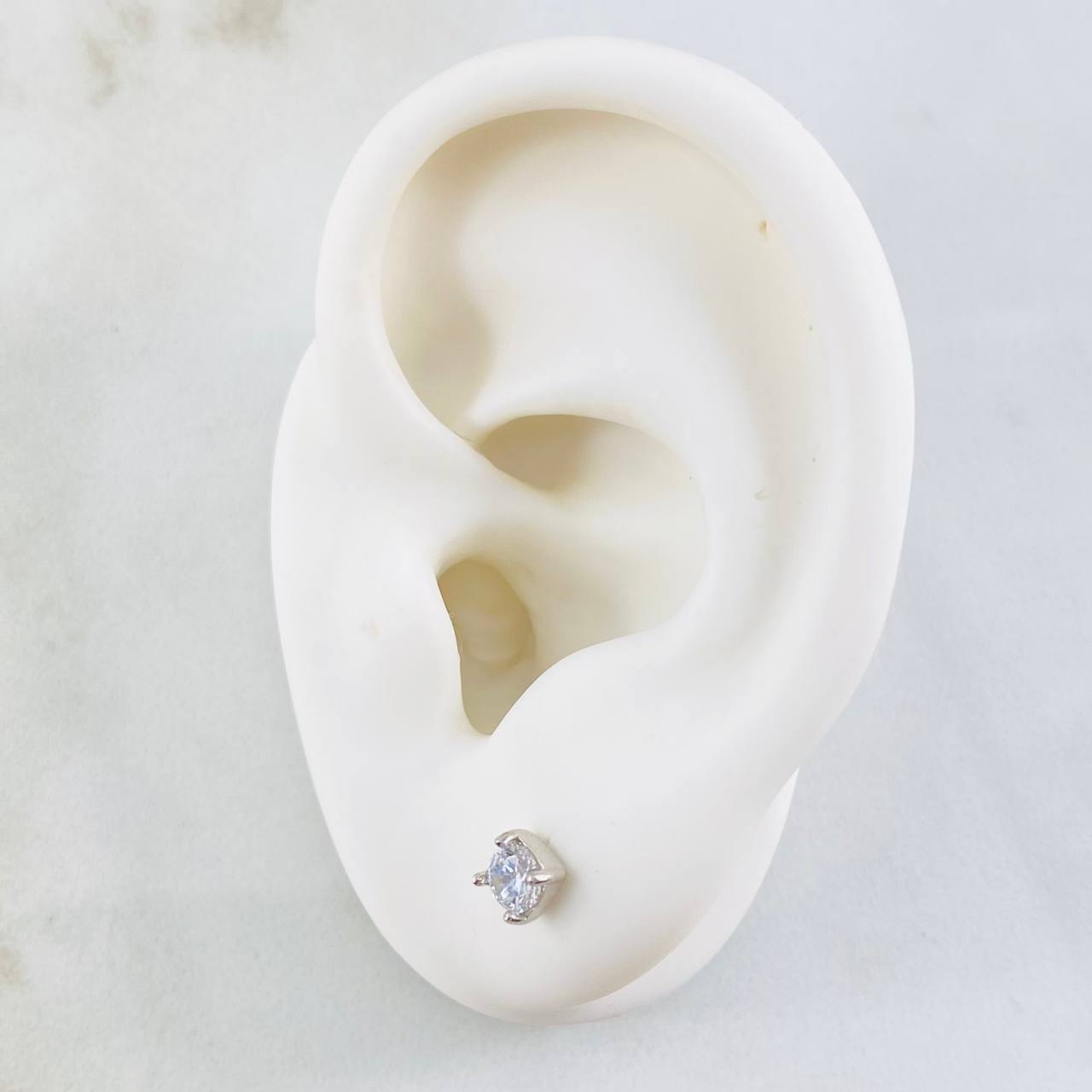 Topos Bisel 0.85gr / Oro Blanco 18K *