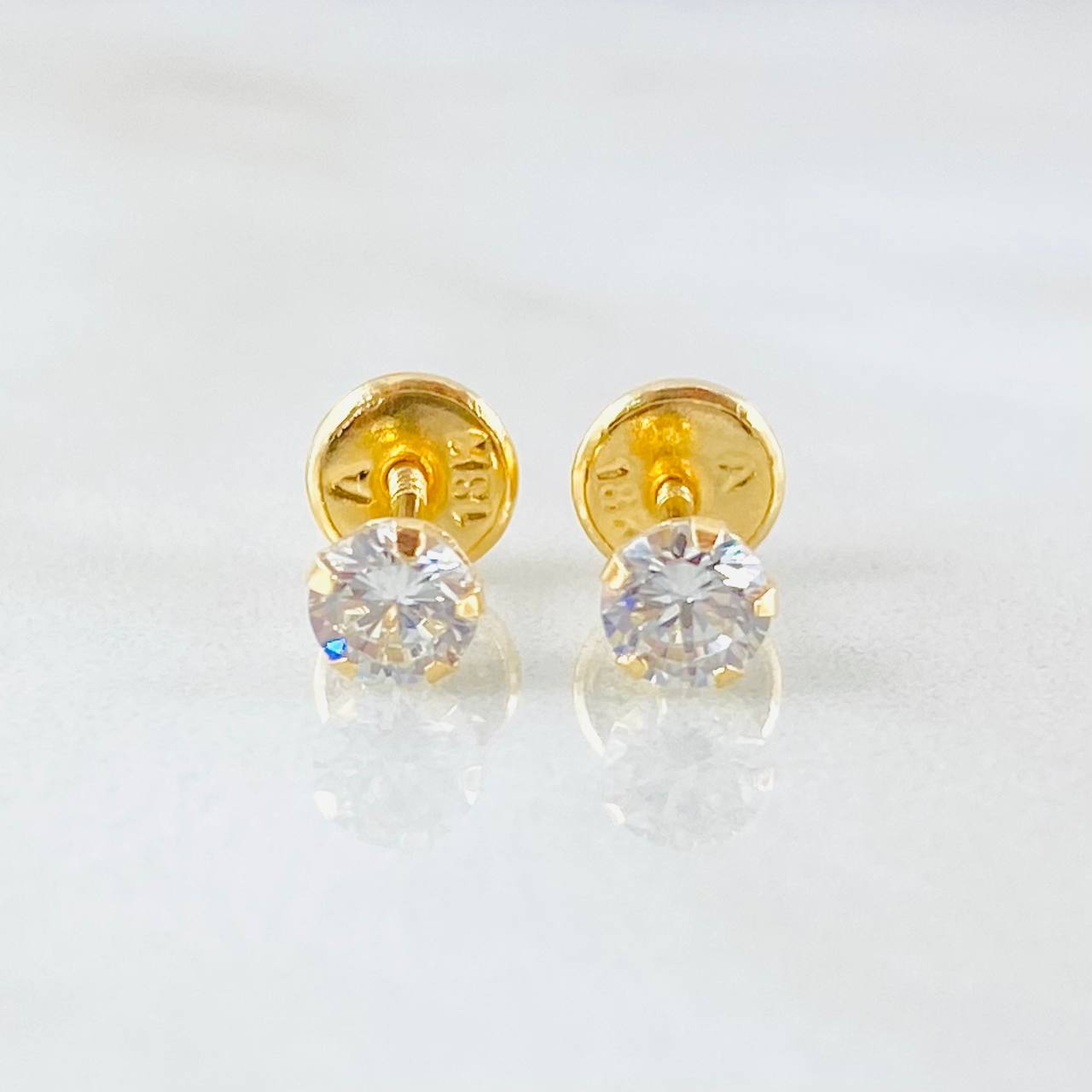 Topos Bisel 0.65gr / Oro Amarillo 18K *