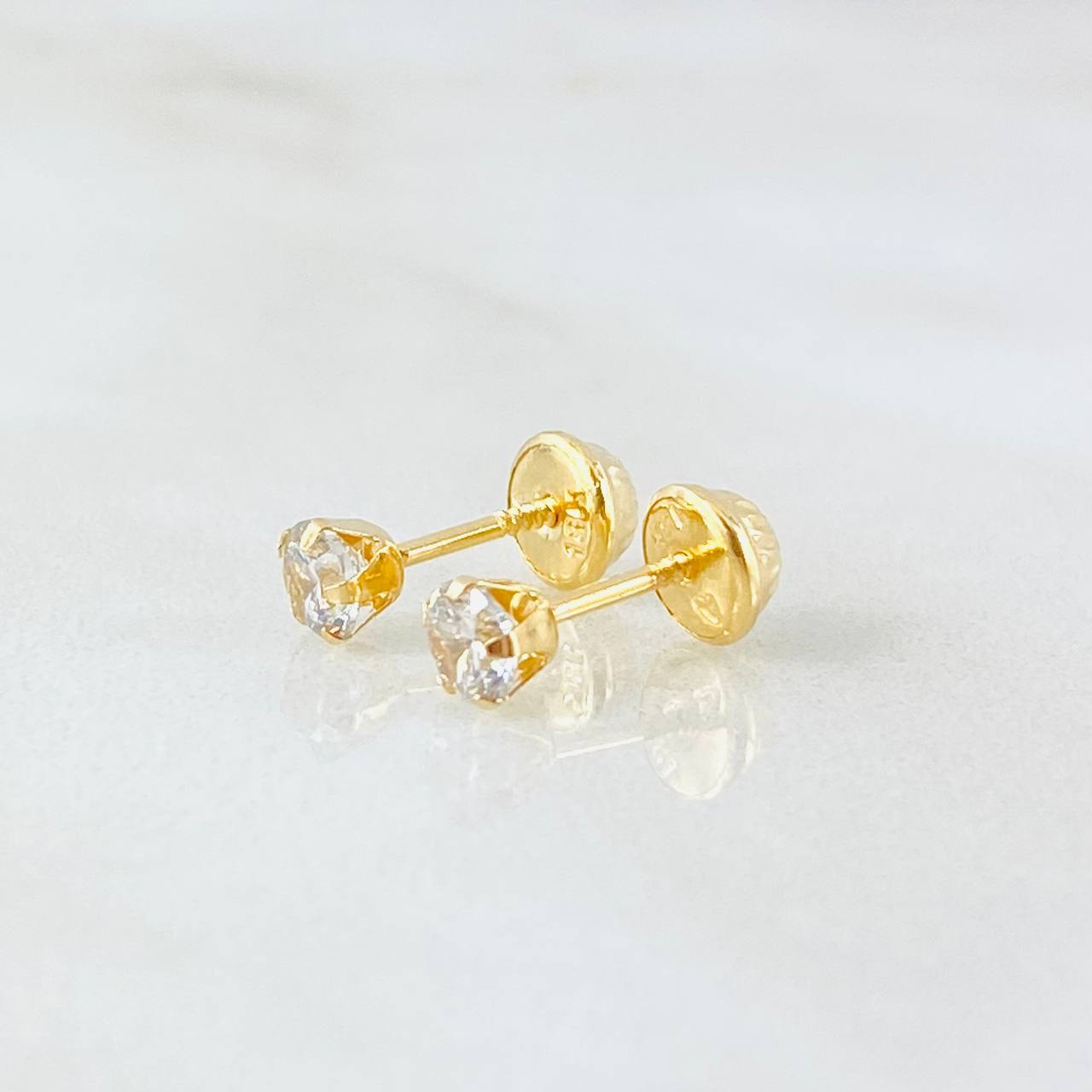 Topos Bisel 0.65gr / Oro Amarillo 18K *